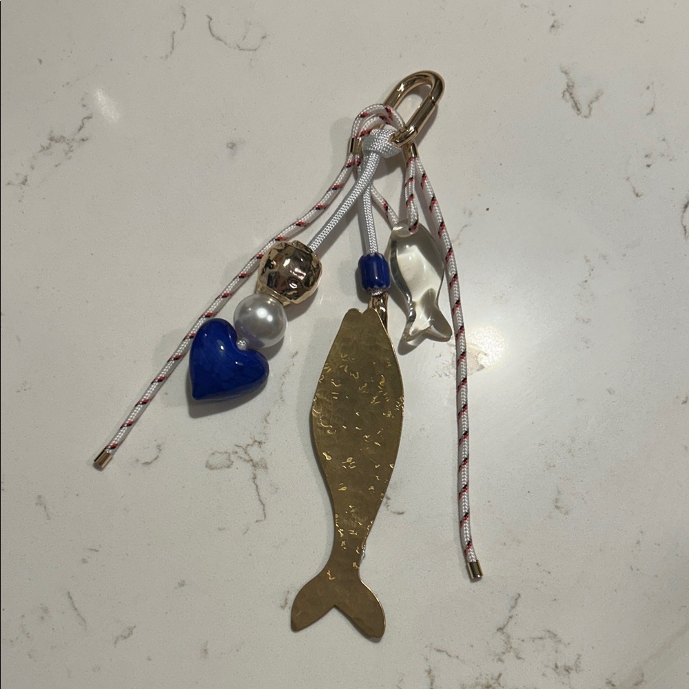 Gold and Blue Fish Carabiner Icon Bag Charm by Anthropologie